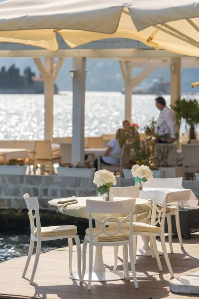 Outdoor restaurant in Perast village in Kotor Bay, Montenegro. — Stock Photo, Image