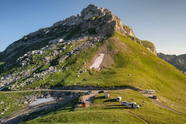 Sedlo Pass in Durmitor National Park is the highest road pass in Montenegro. UNESCO World Heritage site. Car tourists and campers enjoying sunset at the mountain pass