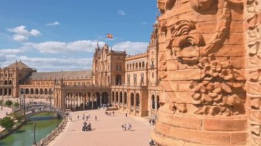 Spanish Square or Plaza de Espana at sunny day in Seville, Spain. View over Plaza de Espana palace in Sevilla, Andalusia, Spain. Slow revealing footage