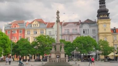Ostrava, Czech Republic - June 14, 2022: Masaryk Square in Ostrava old town. Ostrava Museum, Marian Plague Column and the colourful facades of historic buildings in Ostrava city center.
