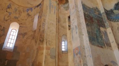 Van, Turkey - October 16, 2021: Interior of Armenian Cathedral Church of Holy Cross on Akdamar Island, Van Lake, Turkey. Slow panning of ancient Armenian Church interior