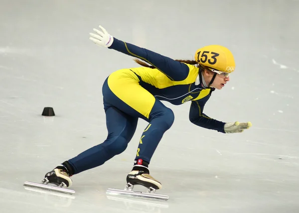 Dámský 1000 m ohřívá krátké trati tepel — Stock fotografie