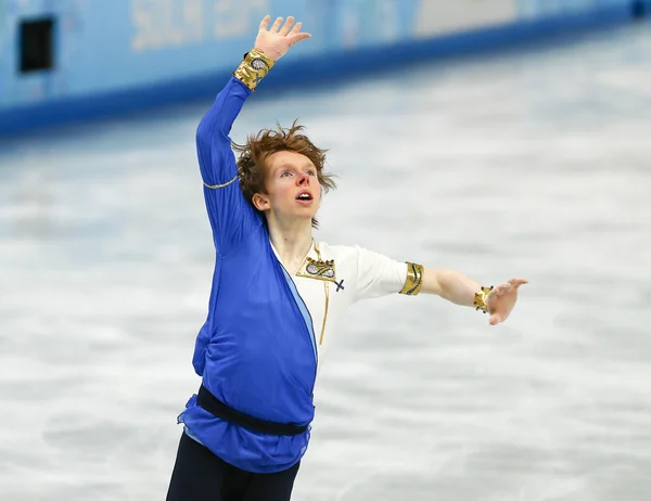 Patinaje artístico. Hombres patinaje libre — Foto de Stock