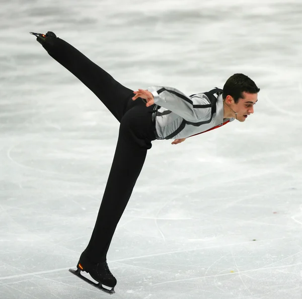 Patinaje artístico. Hombres patinaje libre —  Fotos de Stock