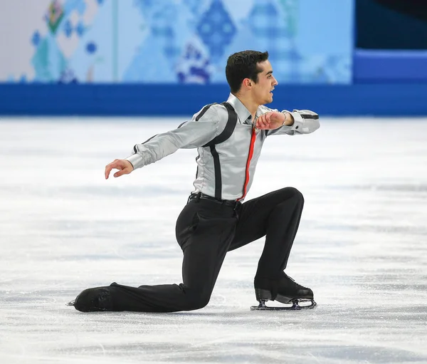 Patinação artística. Homens patinagem livre — Fotografia de Stock