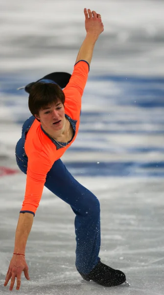 Patinação artística. Homens patinagem livre — Fotografia de Stock