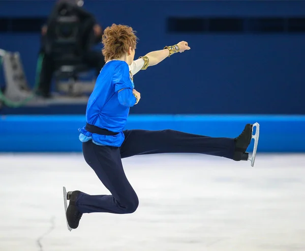 Patinaje artístico. Hombres patinaje libre —  Fotos de Stock