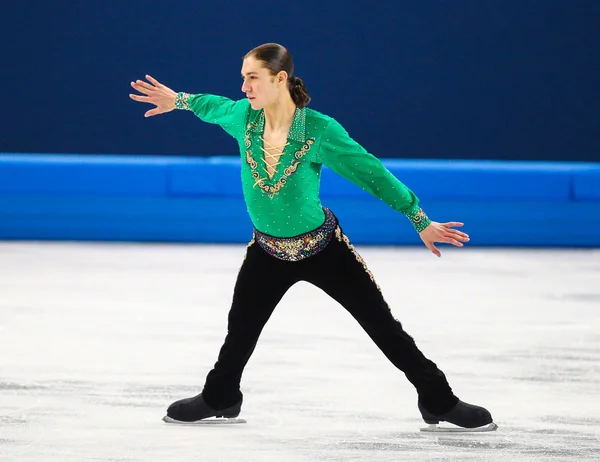 Patinação artística. Homens patinagem livre — Fotografia de Stock