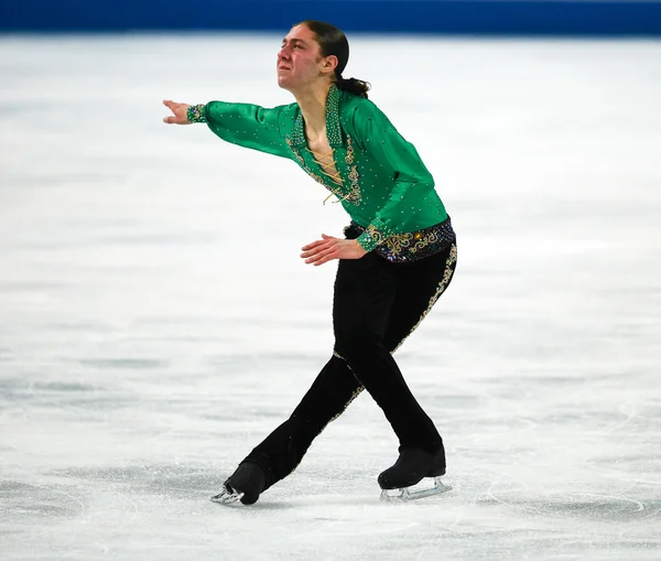 Patinaje artístico. Hombres patinaje libre —  Fotos de Stock