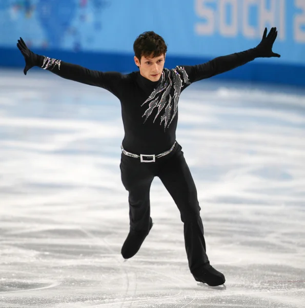 Patinação artística. Homens patinagem livre — Fotografia de Stock