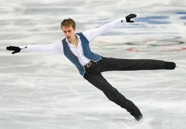 Patinaje artístico. Hombres patinaje libre —  Fotos de Stock