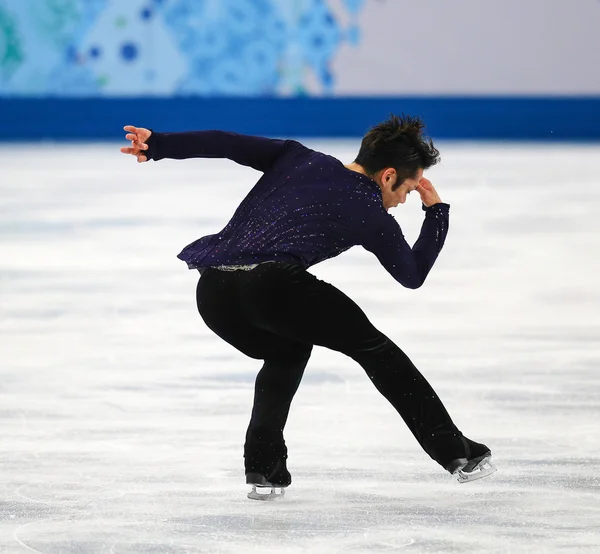 Patinação artística. Homens patinagem livre — Fotografia de Stock