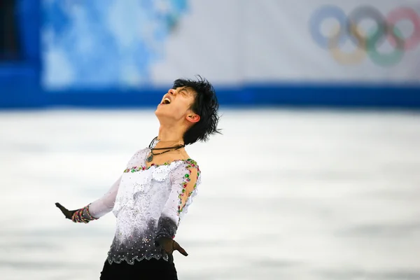 Patinação artística. Homens patinagem livre — Fotografia de Stock