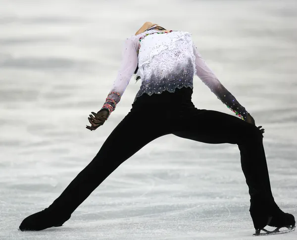 Patinaje artístico. Hombres patinaje libre — Foto de Stock