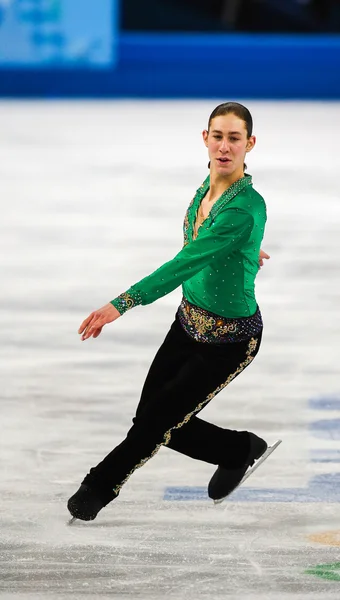 Kunstschaatsen. mannen vrije schaatsen — Stockfoto