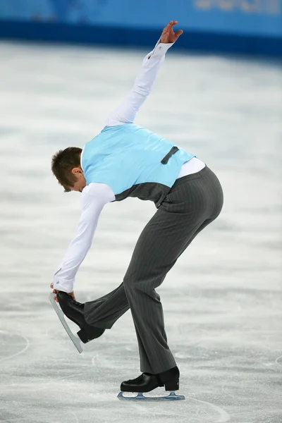 Kunstschaatsen. mannen vrije schaatsen — Stockfoto