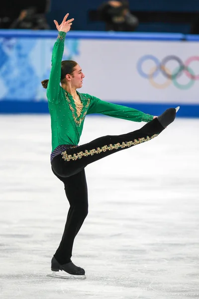 Patinaje artístico. Hombres patinaje libre —  Fotos de Stock