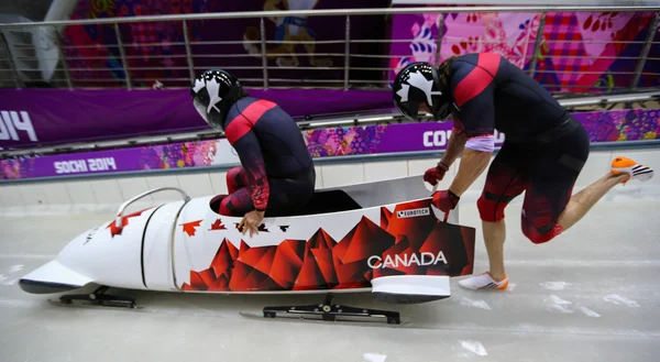 Dos hombres bobsleigh calor — Foto de Stock
