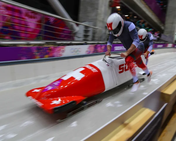 Dos hombres bobsleigh calor —  Fotos de Stock