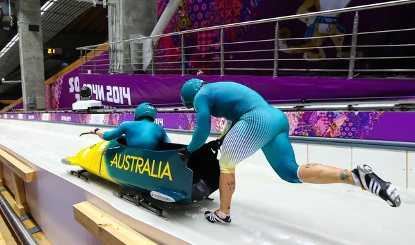 Dos hombres bobsleigh calor — Foto de Stock