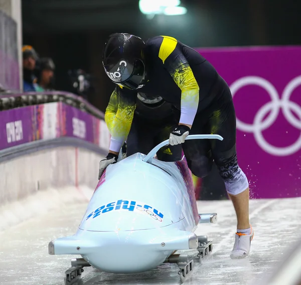 Dos hombres bobsleigh calor — Foto de Stock