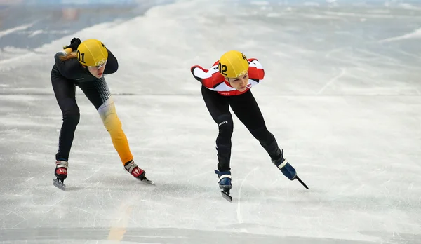 Signore '1000 m riscalda brevi riscaldamenti pista — Foto Stock