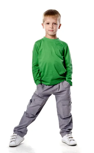 Full length portrait of a happy little boy standing isolated ove — Stock Photo, Image