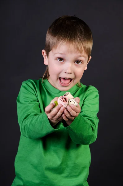 Niño con caramelo —  Fotos de Stock