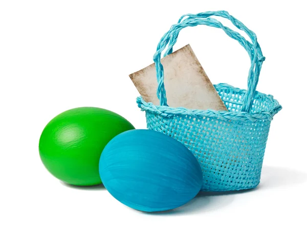 复活节彩蛋和蓝色的篮子 — 图库照片