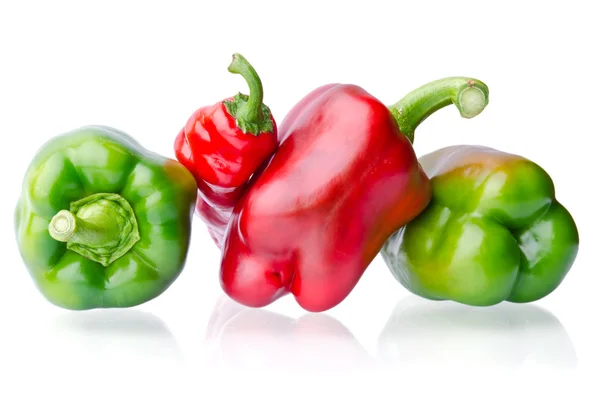 Juicy greens and reds peppers isolated on white background — Stock Photo, Image