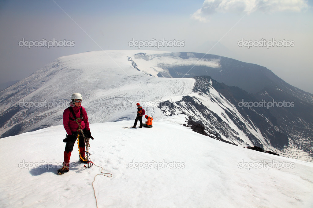 Alpinist on the top of Ostriy Tolbachik volcano.