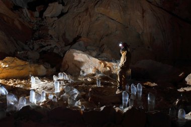 Caver in  Dachstein Mammut Cave. clipart