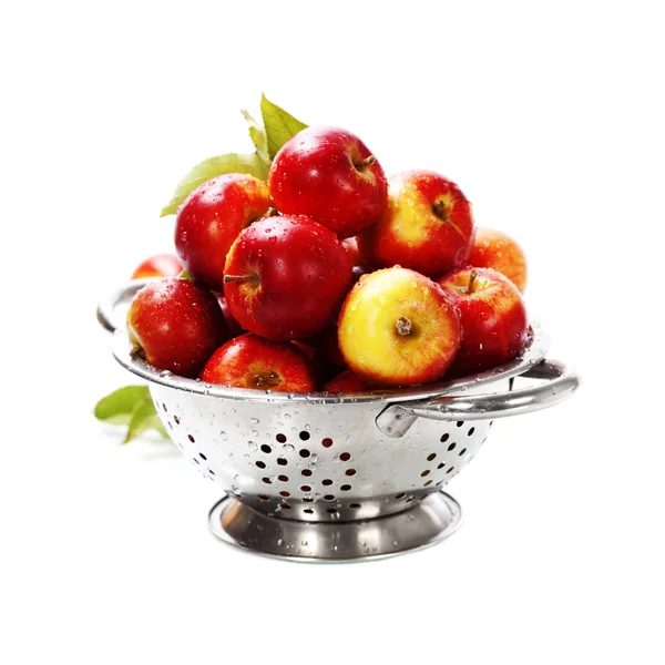 Fresh red apples in metal colander — Stock Photo, Image