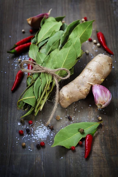 Spices on a wooden board — Stock Photo, Image