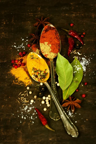 Spices on a wooden board — Stock Photo, Image