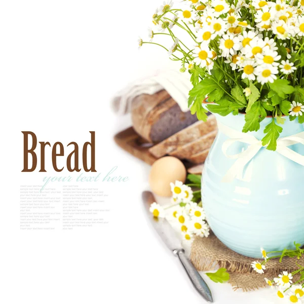 Flowers and bread — Stock Photo, Image