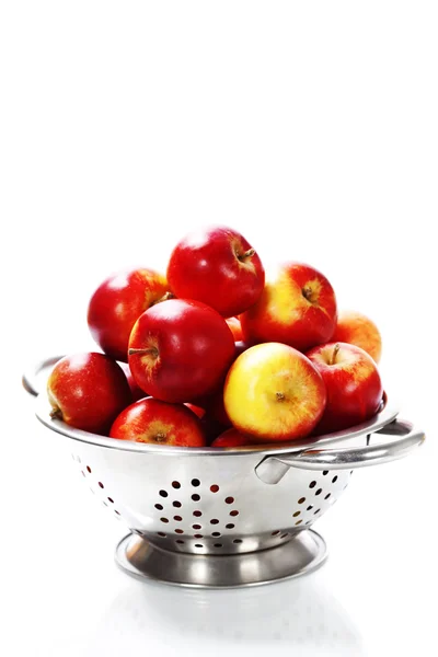 Fresh red apples in metal colander — Stock Photo, Image