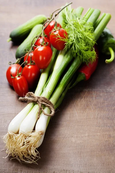 Fresh spring onions and vegetables — Stock Photo, Image