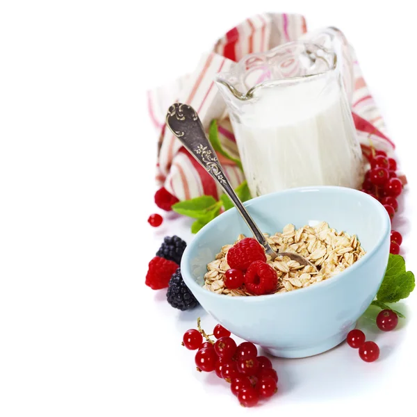 Healthy breakfast with bowl of oat flakes — Stock Photo, Image