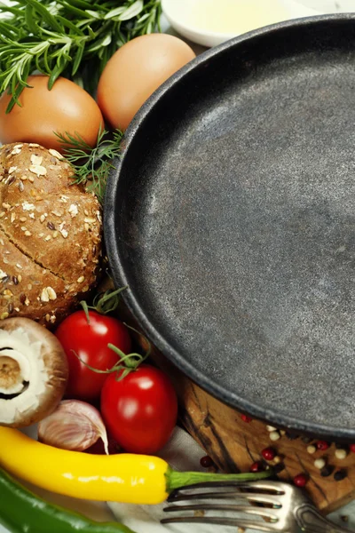 Frying pan and ingredients — Stock Photo, Image