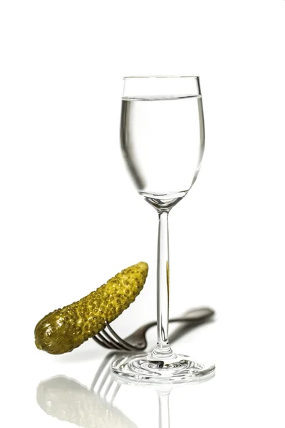 Vodka with pickled cucumber — Stock Photo, Image