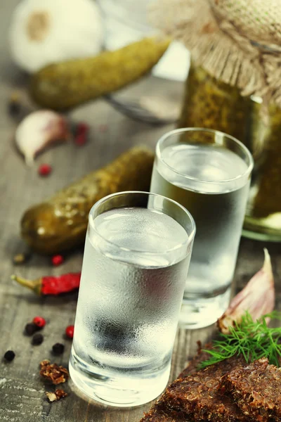 Russian vodka with traditional black bread and pickles — Stock Photo, Image