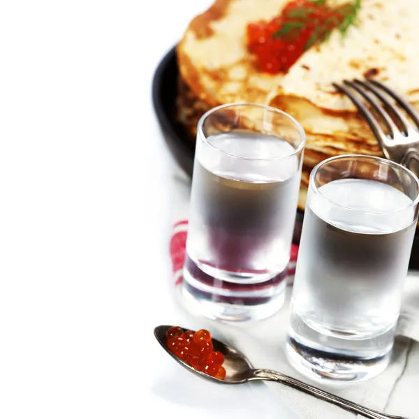 Russian vodka with pancakes and red caviar — Stock Photo, Image