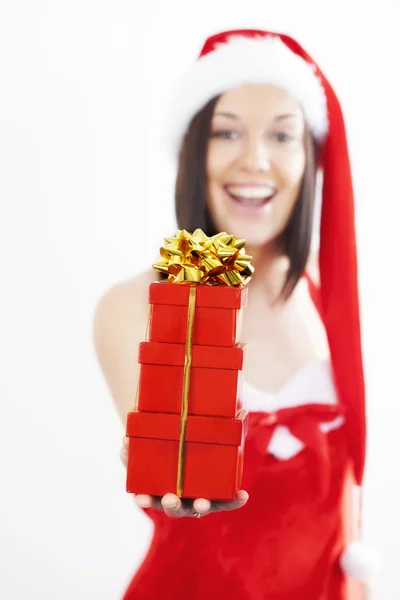 Beautiful young woman with Christmas present Royalty Free Stock Photos