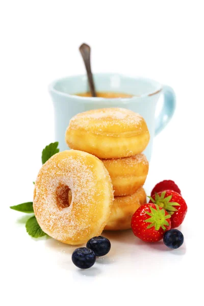 Kaffe och färska donuts — Stockfoto