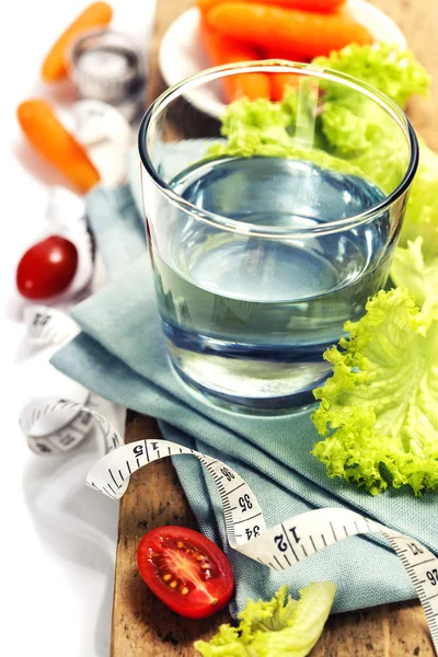 Fresh healthy vegetables and water — Stock Photo, Image