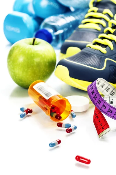 Different tools for sport and pills — Stock Photo, Image