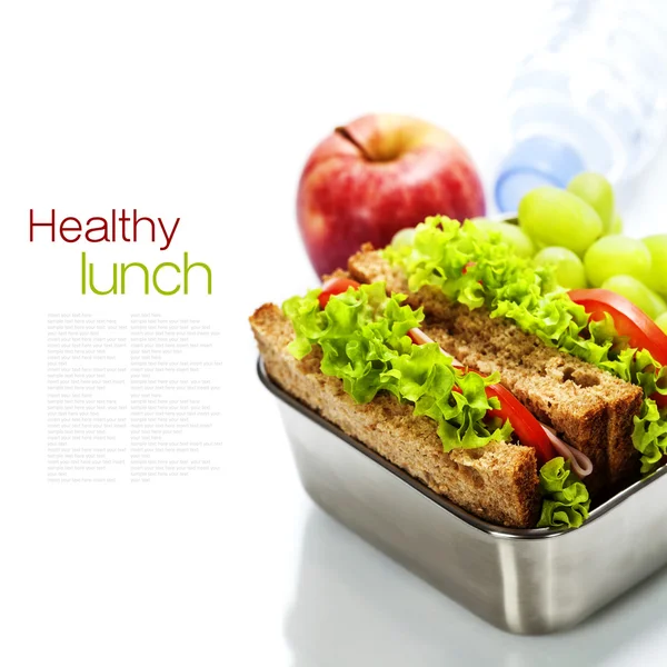 Lunch box with sandwiches and fruits — Stock Photo, Image