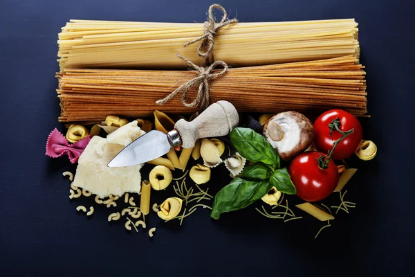 Italian ingredients - pasta, vegetables, spices, cheese — Stock Photo, Image