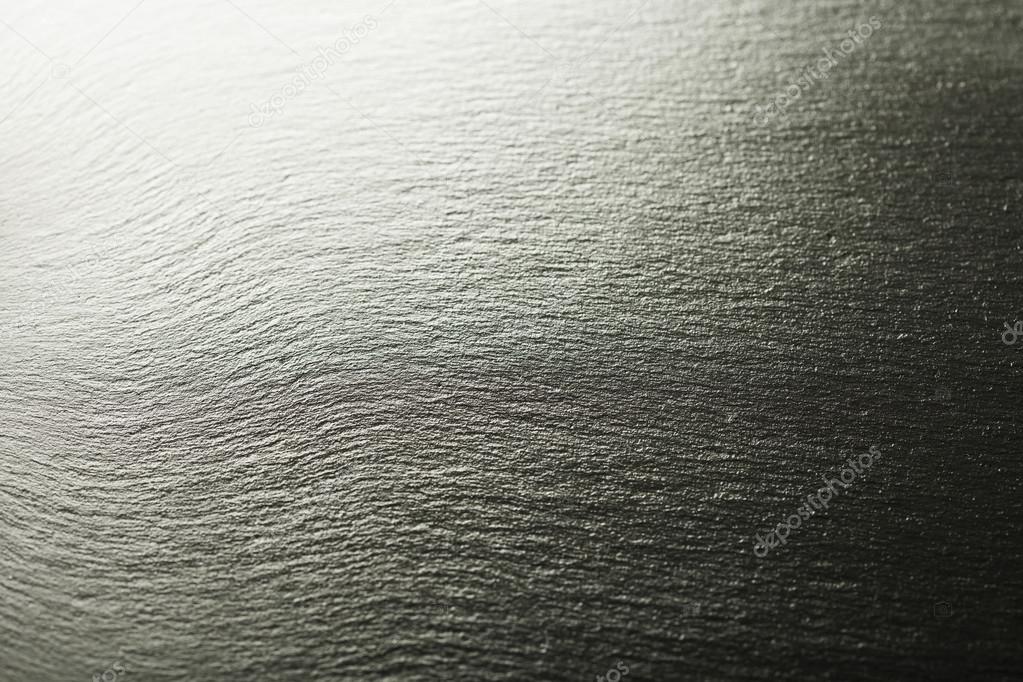 Empty black stone background